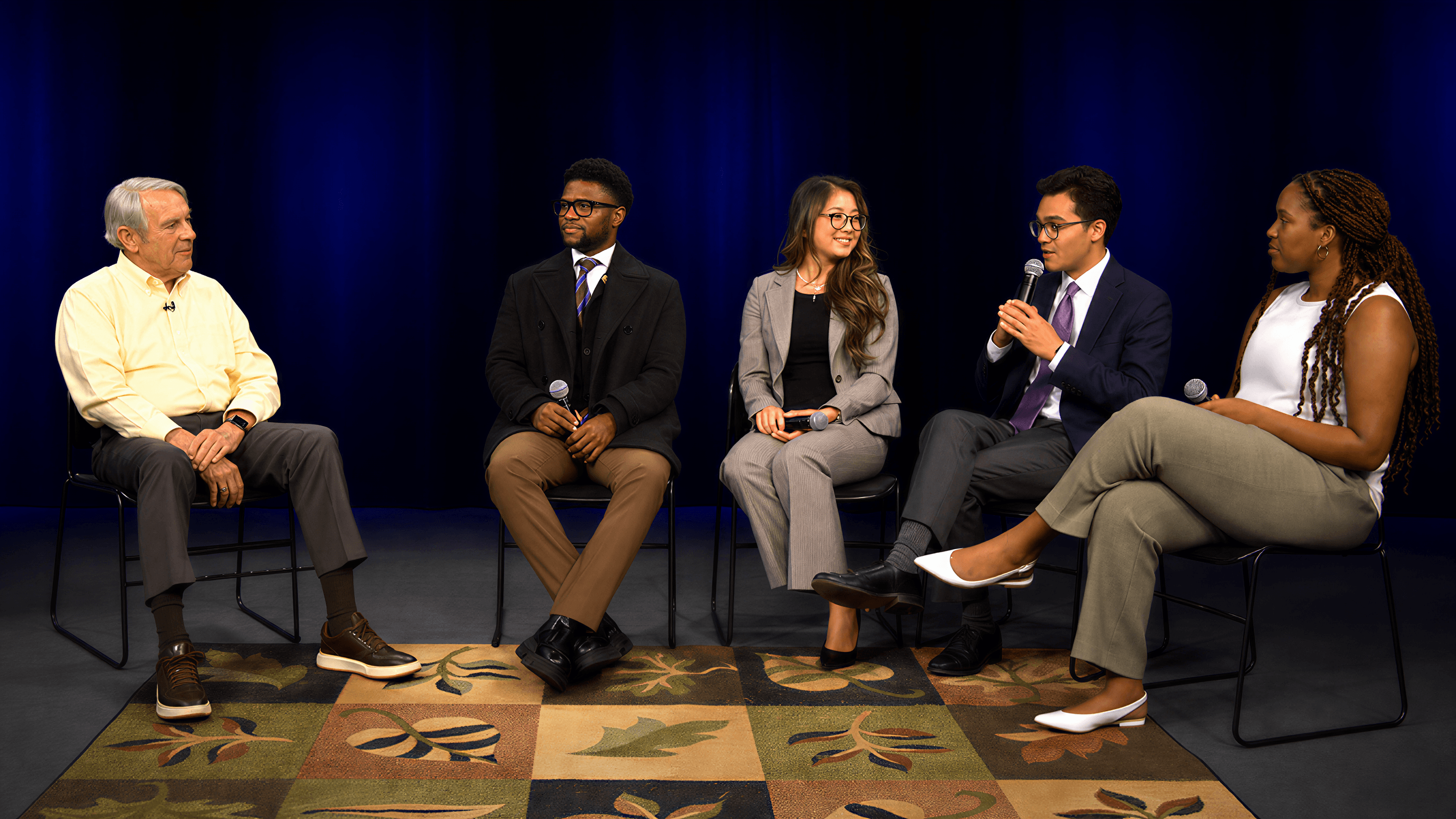 A multigenerational panel of nonprofit leaders discussing how to move forward without waiting for perfection